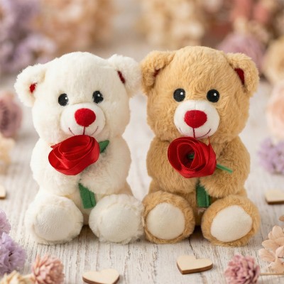 Orsetto di peluche con rosa