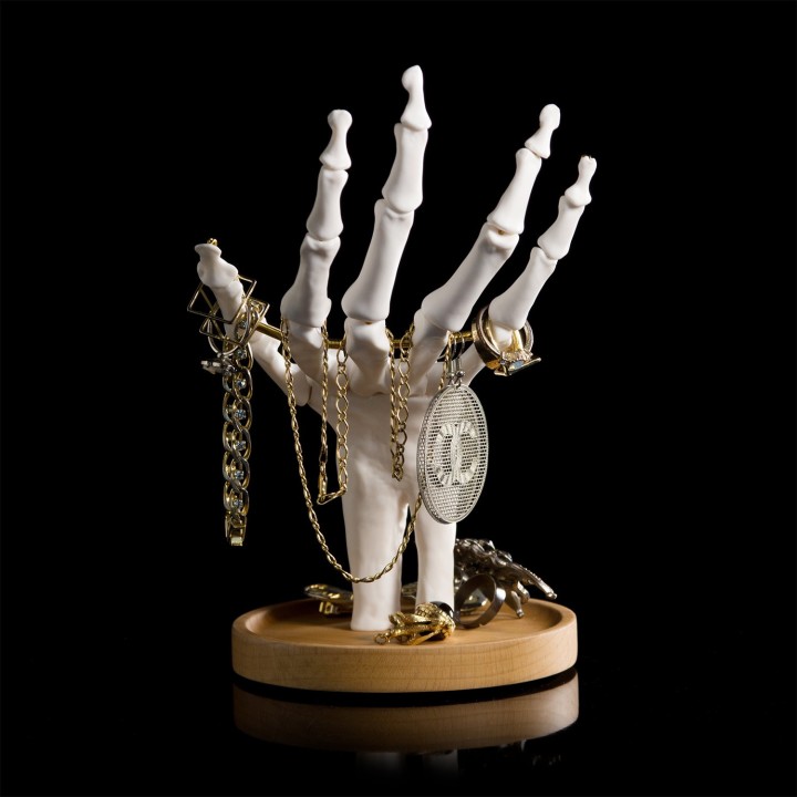 Mano scheletrica portaoggetti